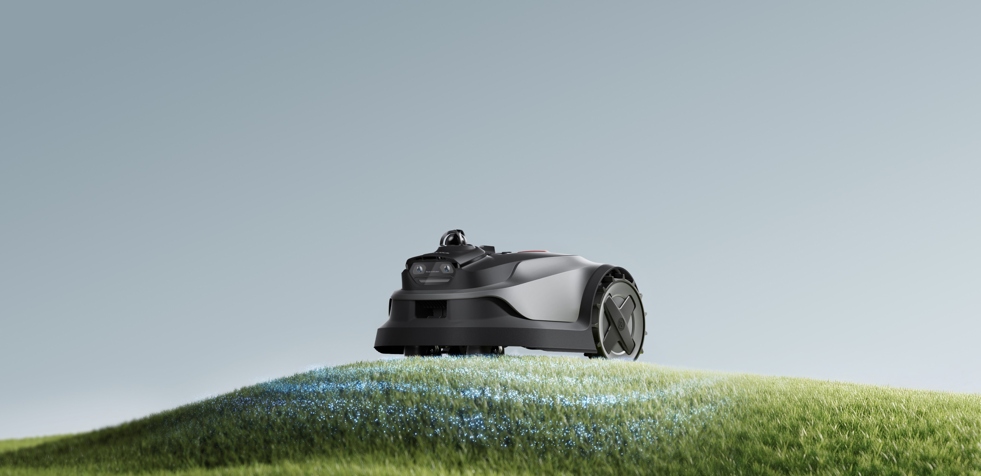 Roborock RockMow S2 LiDAR robotic lawn mower operating across a lush residential yard