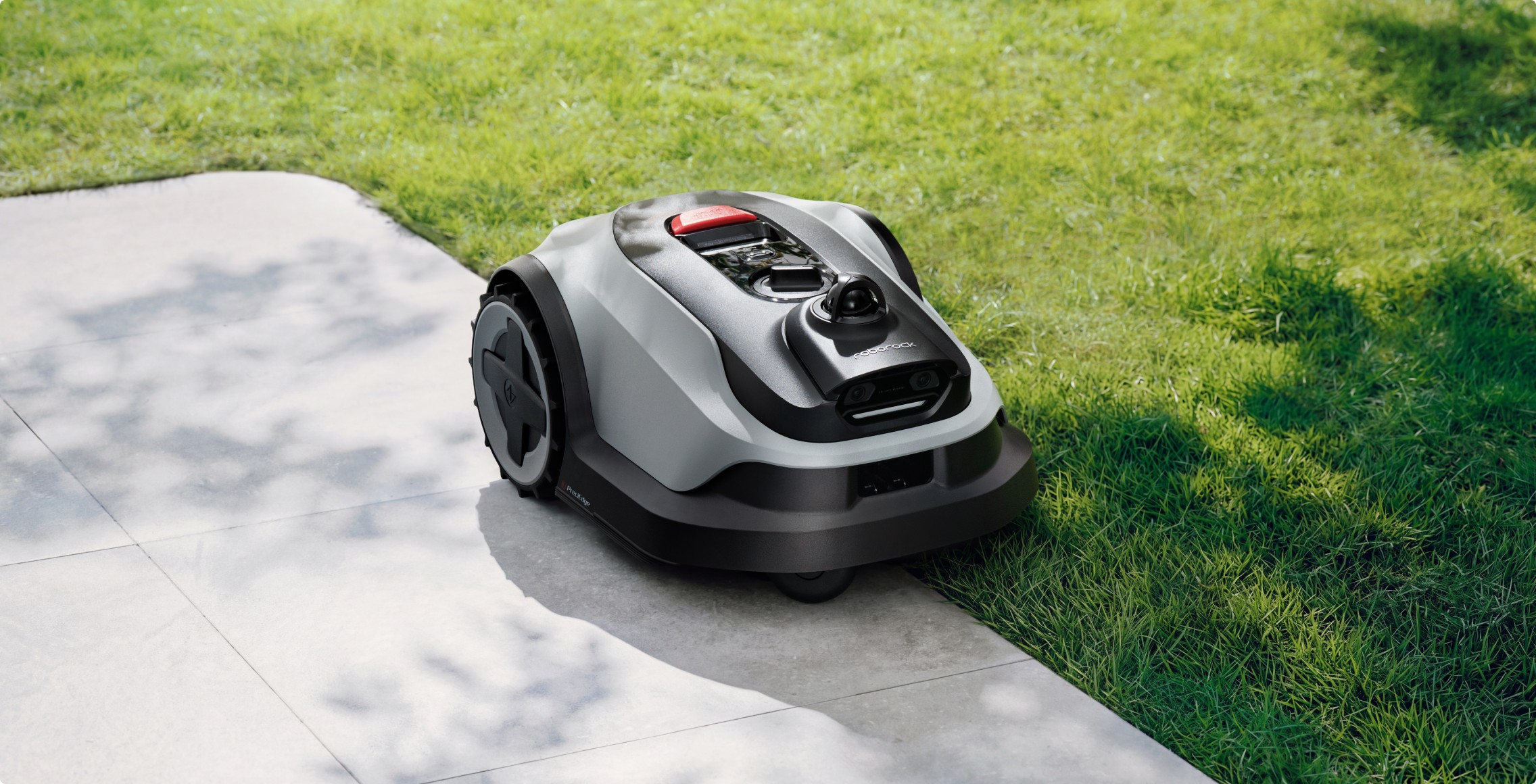 Ride-on boundary mowing technique achieving clean flush cuts next to paving